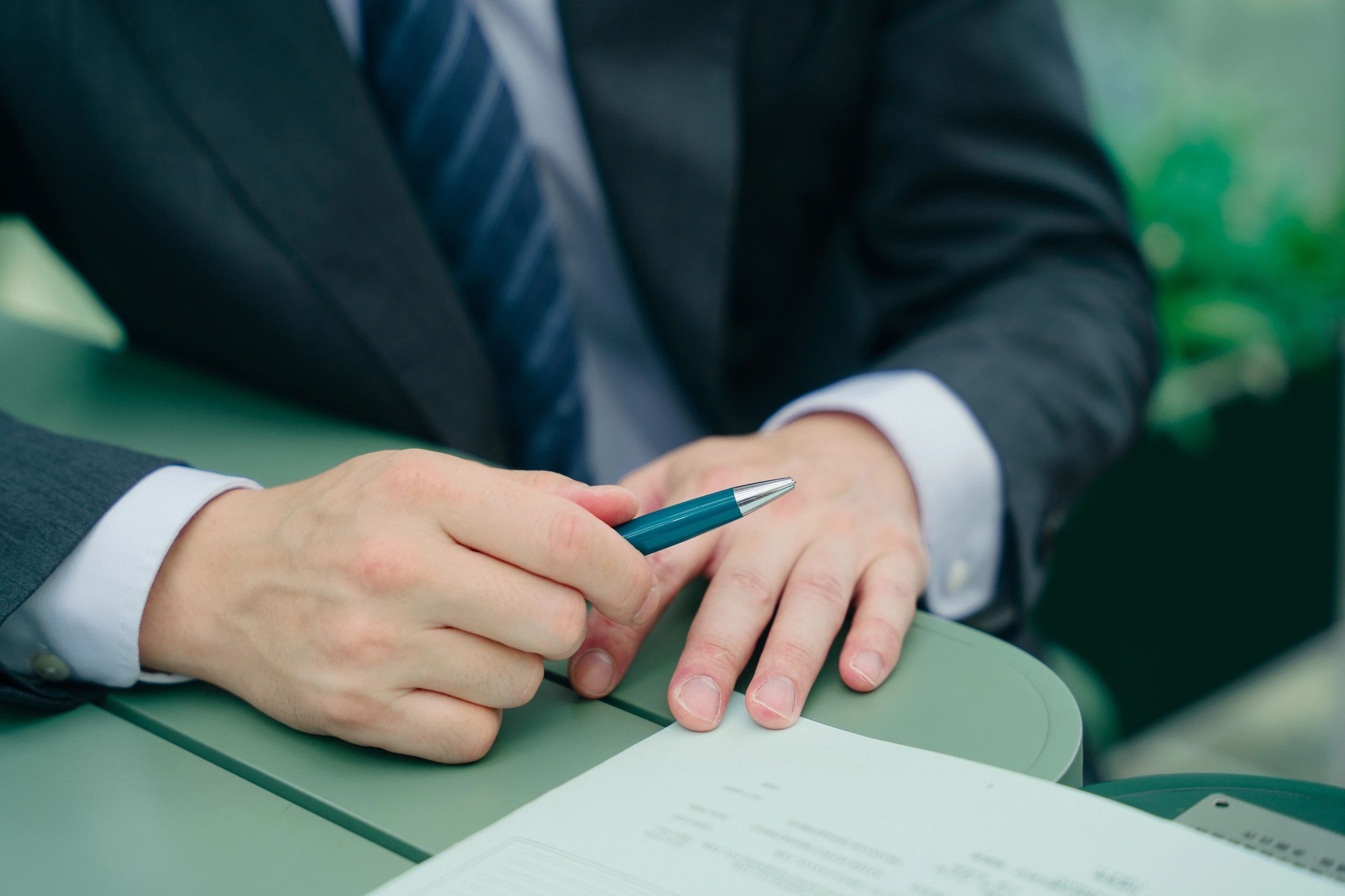 Attorney consultation with documents on the table